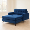 Divano in tessuto blu con gambe in legno massello