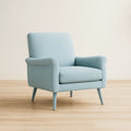 Poltrona in tessuto azzurro con gambe in legno massello