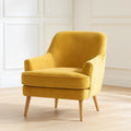 Poltrona in velluto giallo con gambe in legno